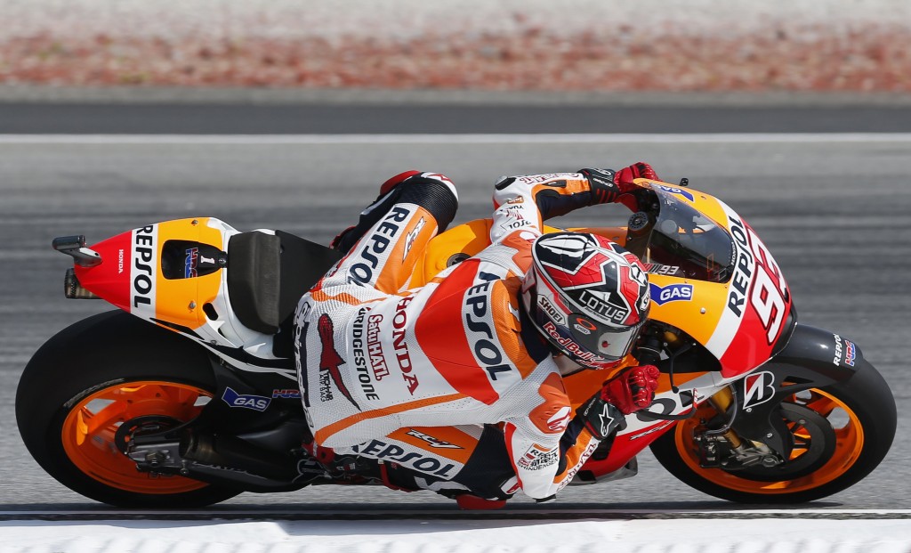 Honda MotoGP rider Marc Marquez of Spain rides during the first free practice session of the Malaysian Motorcycle Grand Prix at Sepang International Circuit near Kuala Lumpur October 24, 2014. The Malaysian Motorcycle Grand Prix will be held on Sunday. REUTERS/Olivia Harris (MALAYSIA - Tags: SPORT MOTORSPORT)